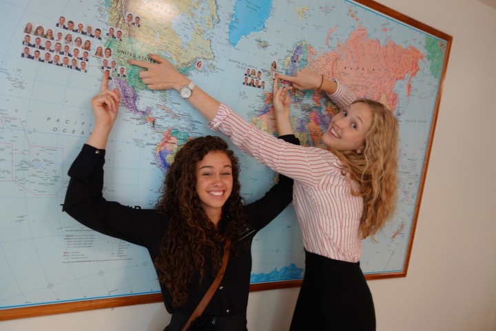 Me and Sister Sorge by the map in the MTC pointing out where we are from and where we are going. Awkwardly one of the Elders is from England, so I'm basically pointing to his face.